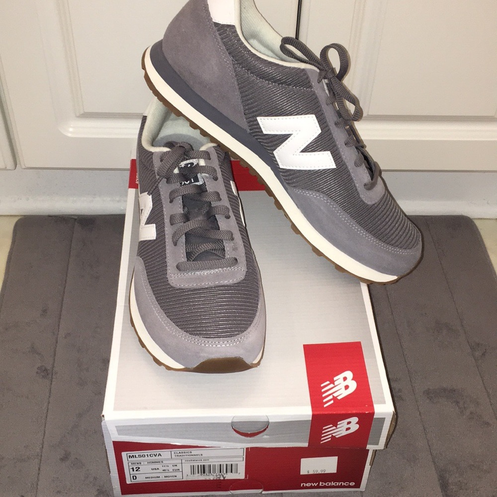 NIB Men’s New Balance Sneakers .